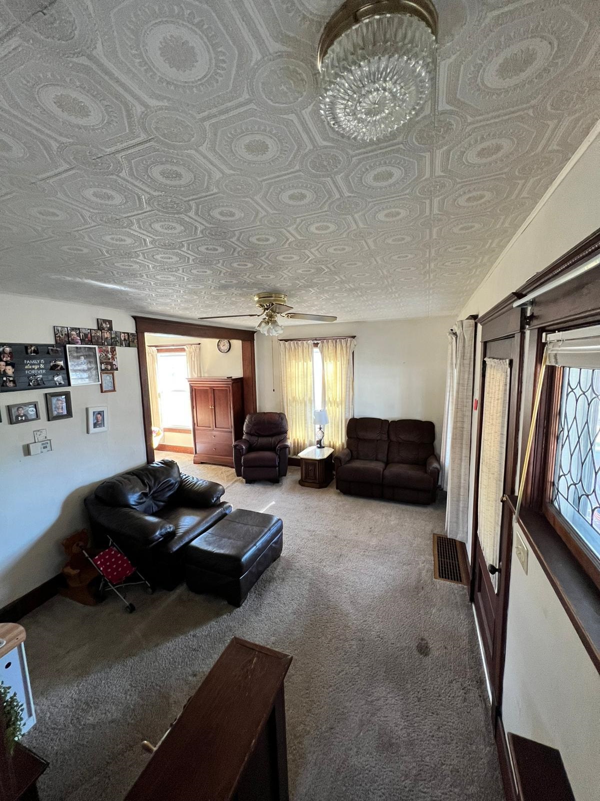 425 North Main Street Stockton, IL 61085 - Photo 7 of 20 a living room with furniture and a window