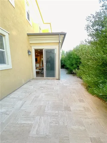 a view of a house with a small yard