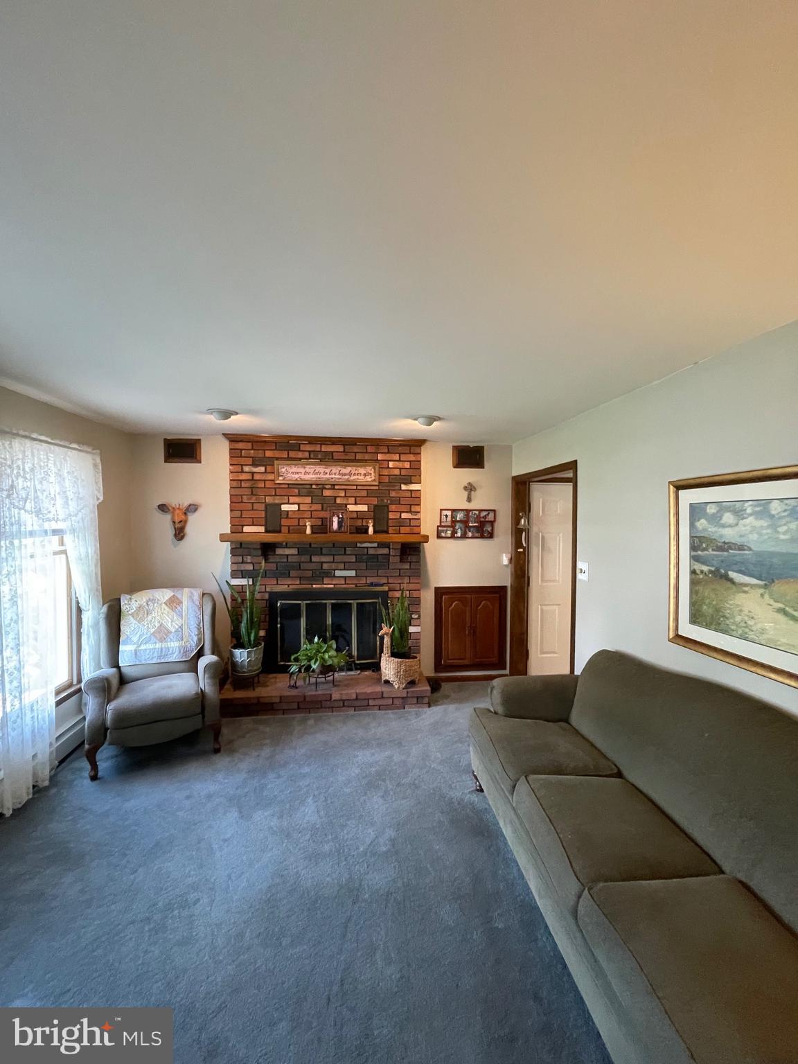 415 Unity Terrace Rutledge, PA 19070 - Photo 3 of 25 Living Room with fireplace