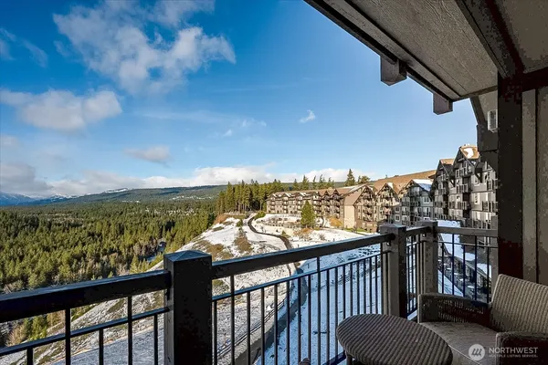 a view of a balcony with an ocean view