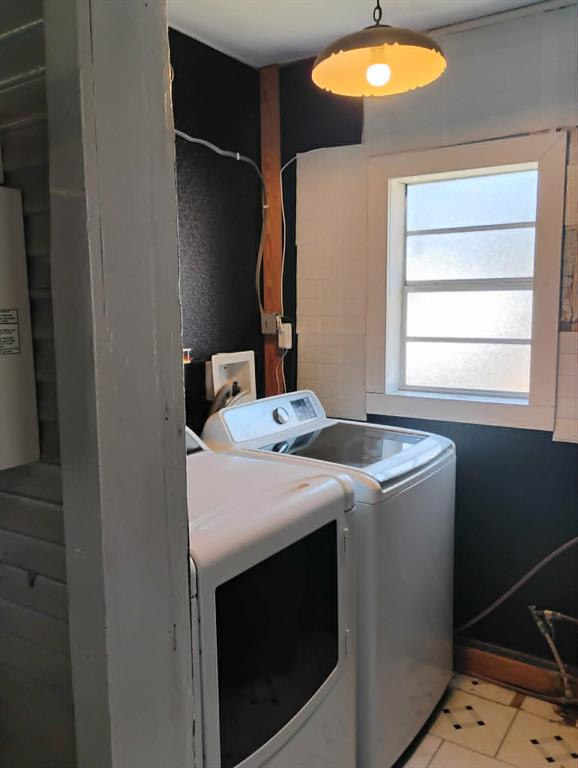 763 Frontier Street Bowie, TX 76230 - Photo 9 of 28 a utility room with dryer and washer