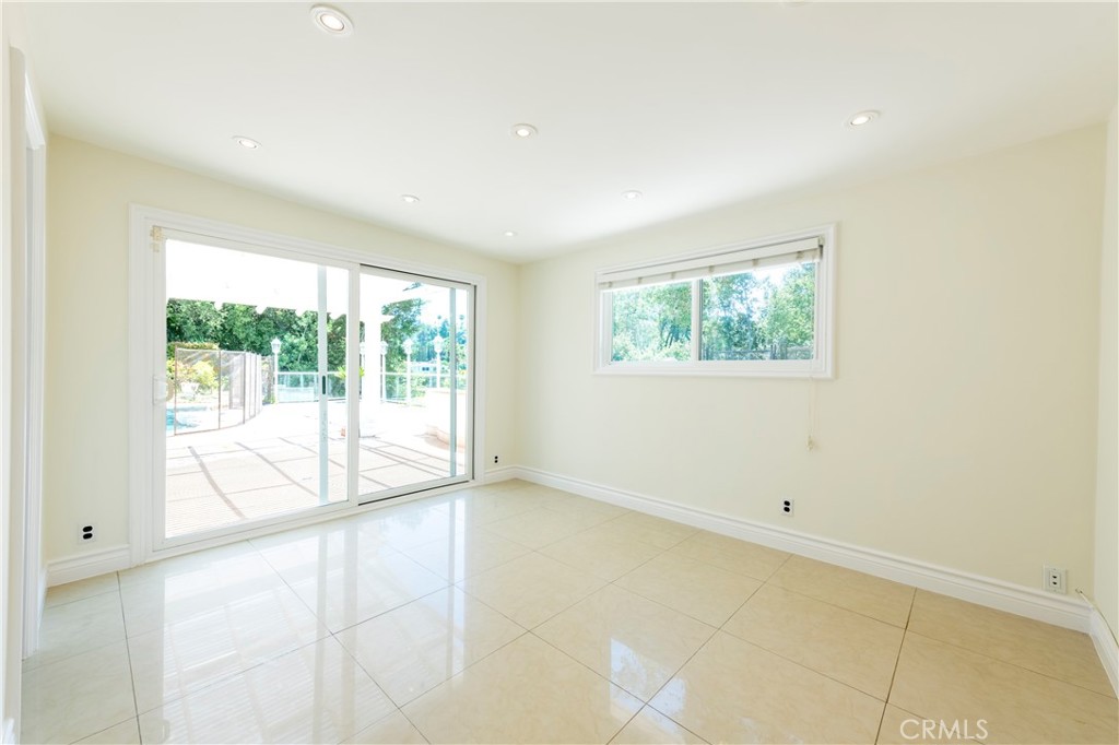 16379 Meadow Ridge Road West Encino, CA 91436 - Photo 28 of 40 a view of an empty room with a window