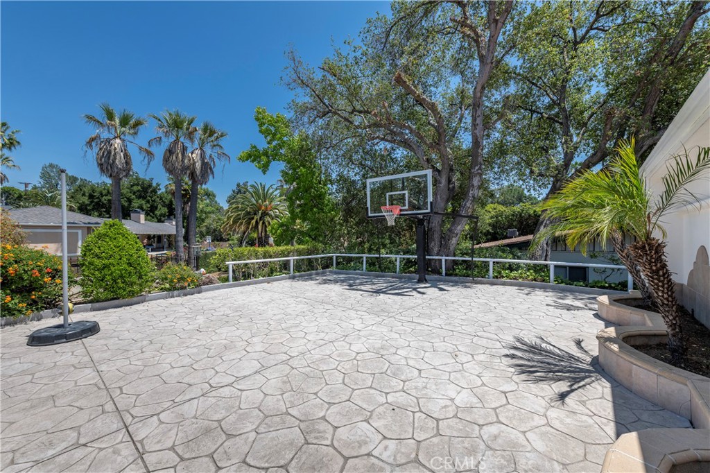 16379 Meadow Ridge Road West Encino, CA 91436 - Photo 40 of 40 a view of a chair and table in the garden