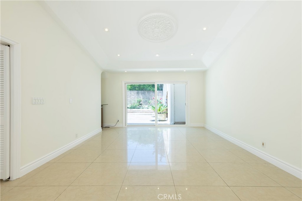 16379 Meadow Ridge Road West Encino, CA 91436 - Photo 6 of 40 a view of an empty room with a window