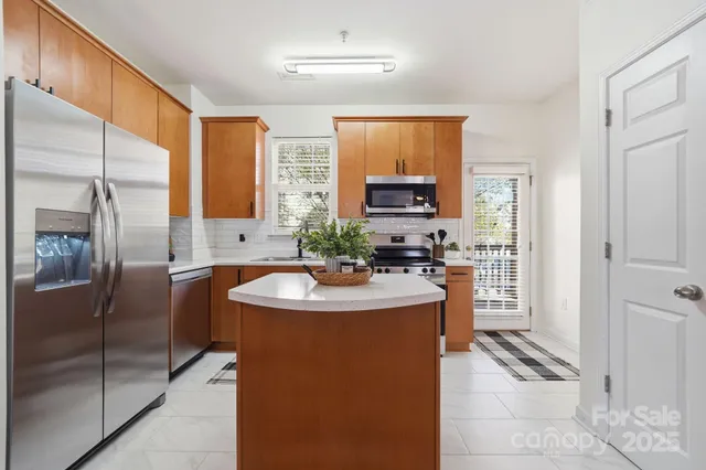 a bathroom with a sink a mirror and a shower