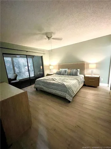 a spacious bathroom with a double vanity sink and a mirror