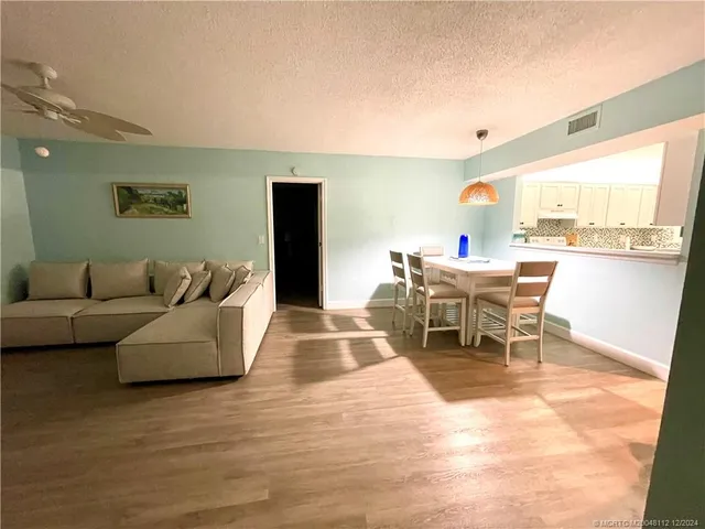 a room with furniture and window