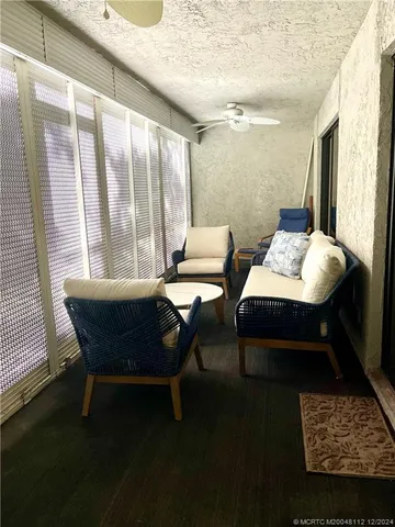 a bedroom with a bed and cabinets