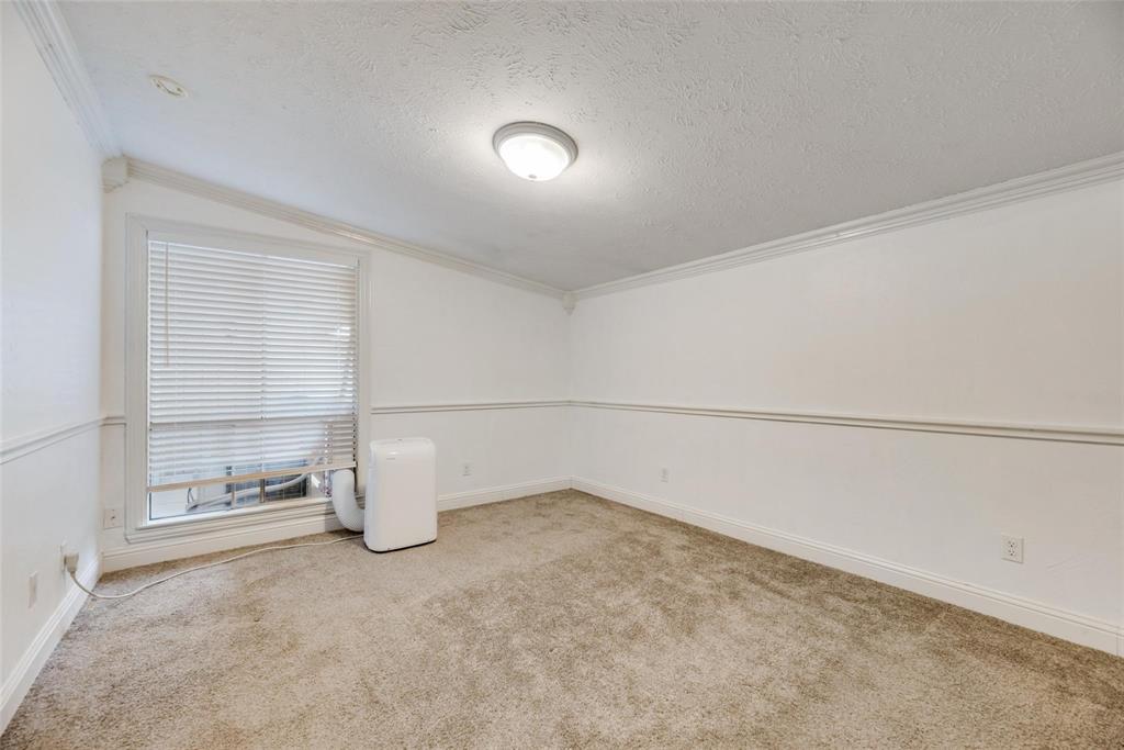 2627 Douglas Avenue, Unit 205 Dallas, TX 75219 - Photo 14 of 17 a view of an empty room
