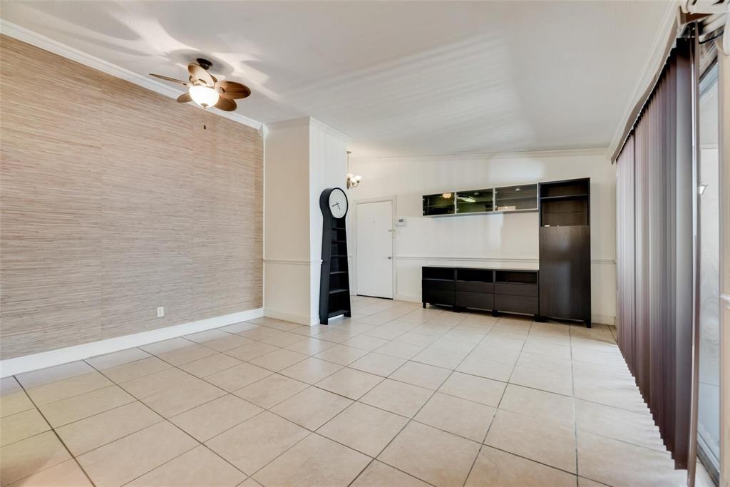 2627 Douglas Avenue, Unit 205 Dallas, TX 75219 - Photo 2 of 17 a view of a utility room with cabinets