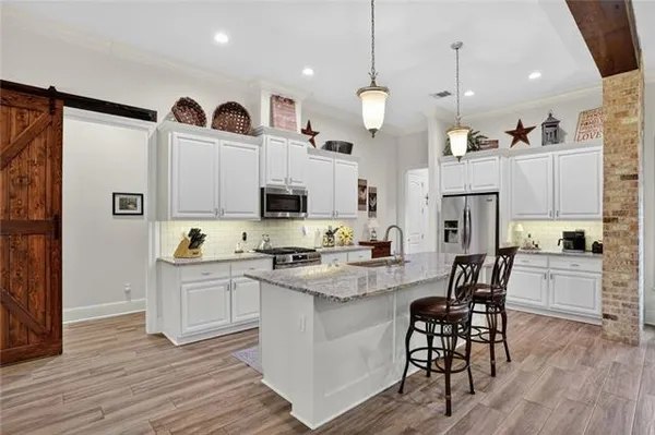 $475,000 | 1121 Cypress Crossing Drive, Madisonville, LA 70447