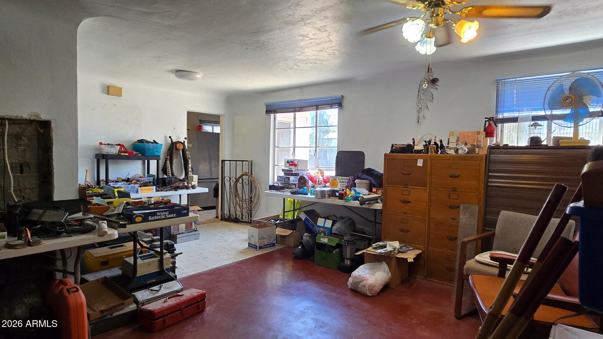 6803 South Miller Road Buckeye, AZ 85326 - Photo 12 of 50 a room with furniture and gym equipment