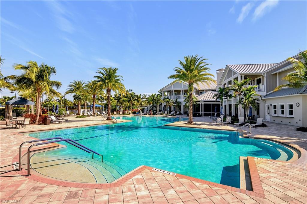 20179 Torch Key Way Estero, FL 33928 - Photo 18 of 25 swimming pool with outdoor seating