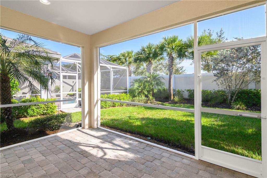 20179 Torch Key Way Estero, FL 33928 - Photo 8 of 25 a view of a porch with a yard