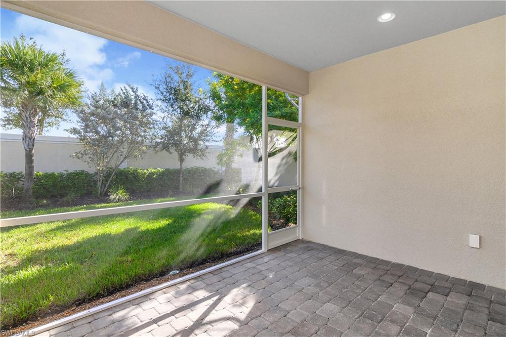 20179 Torch Key Way Estero, FL 33928 - Photo 9 of 25 a view of a backyard with garden