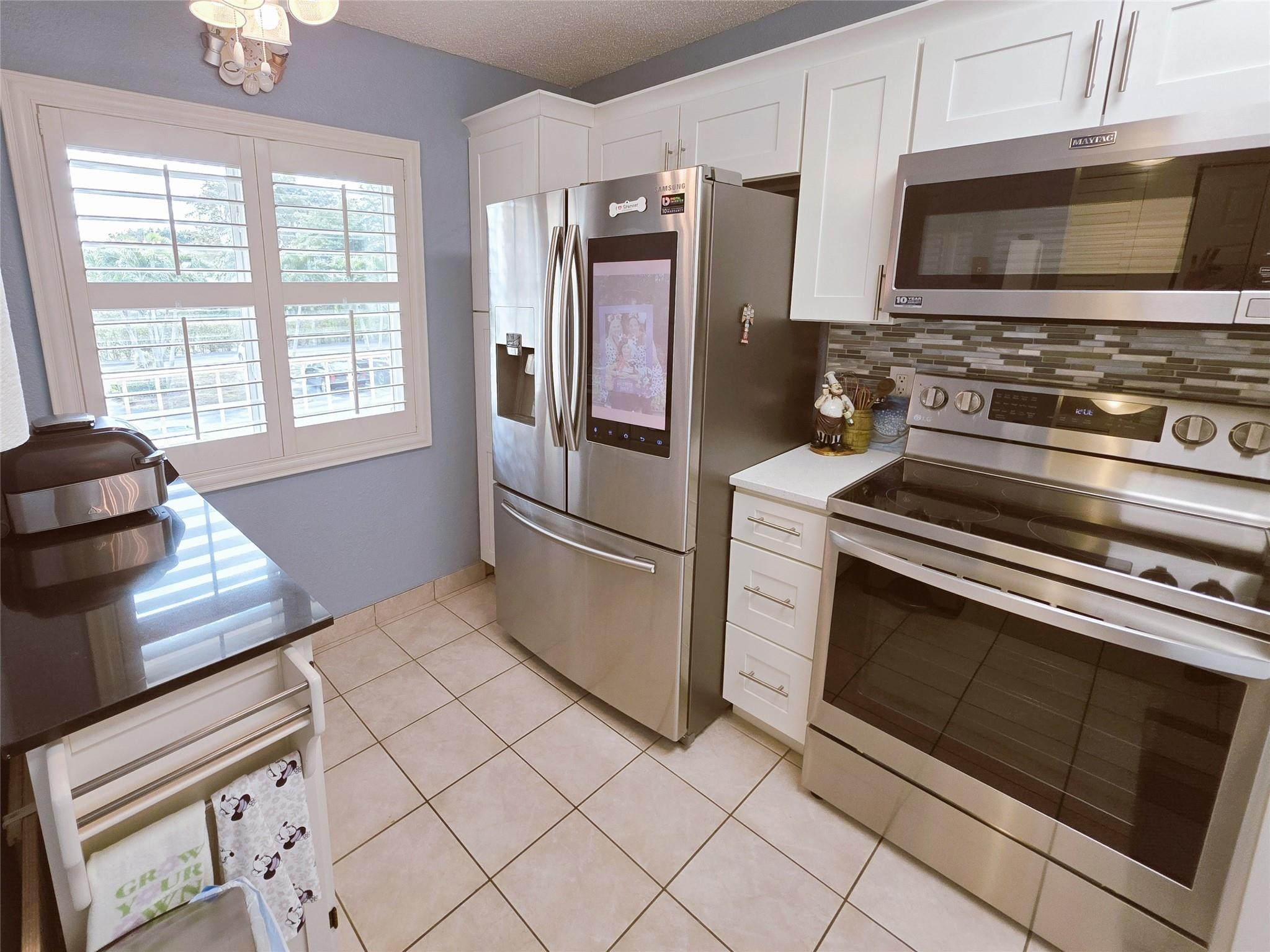 7145 Huntington Lane, Unit 208 Delray Beach, FL 33446 - Photo 1 of 22 Photo 1