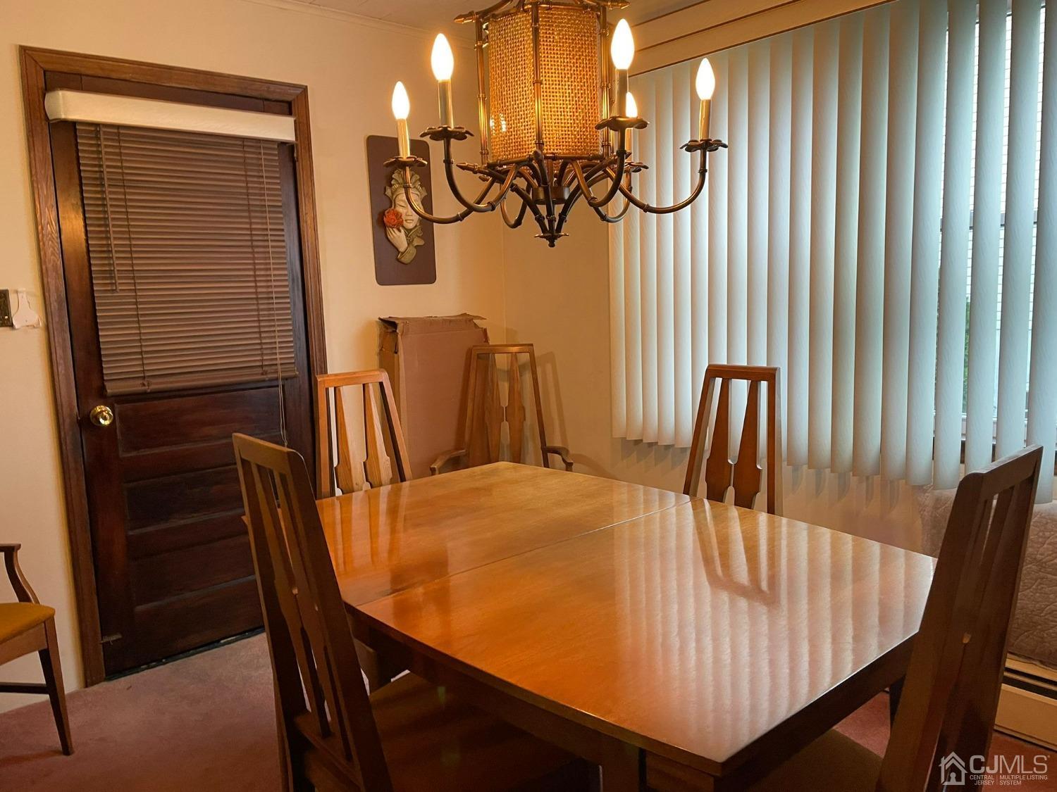148 Oxford Road Colonia, NJ 07067 - Photo 4 of 9 a view of a dining room with furniture