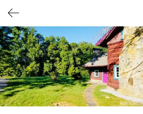 a view of swimming pool with a yard