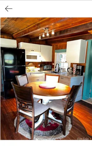 a room with table tennis pool table and chairs