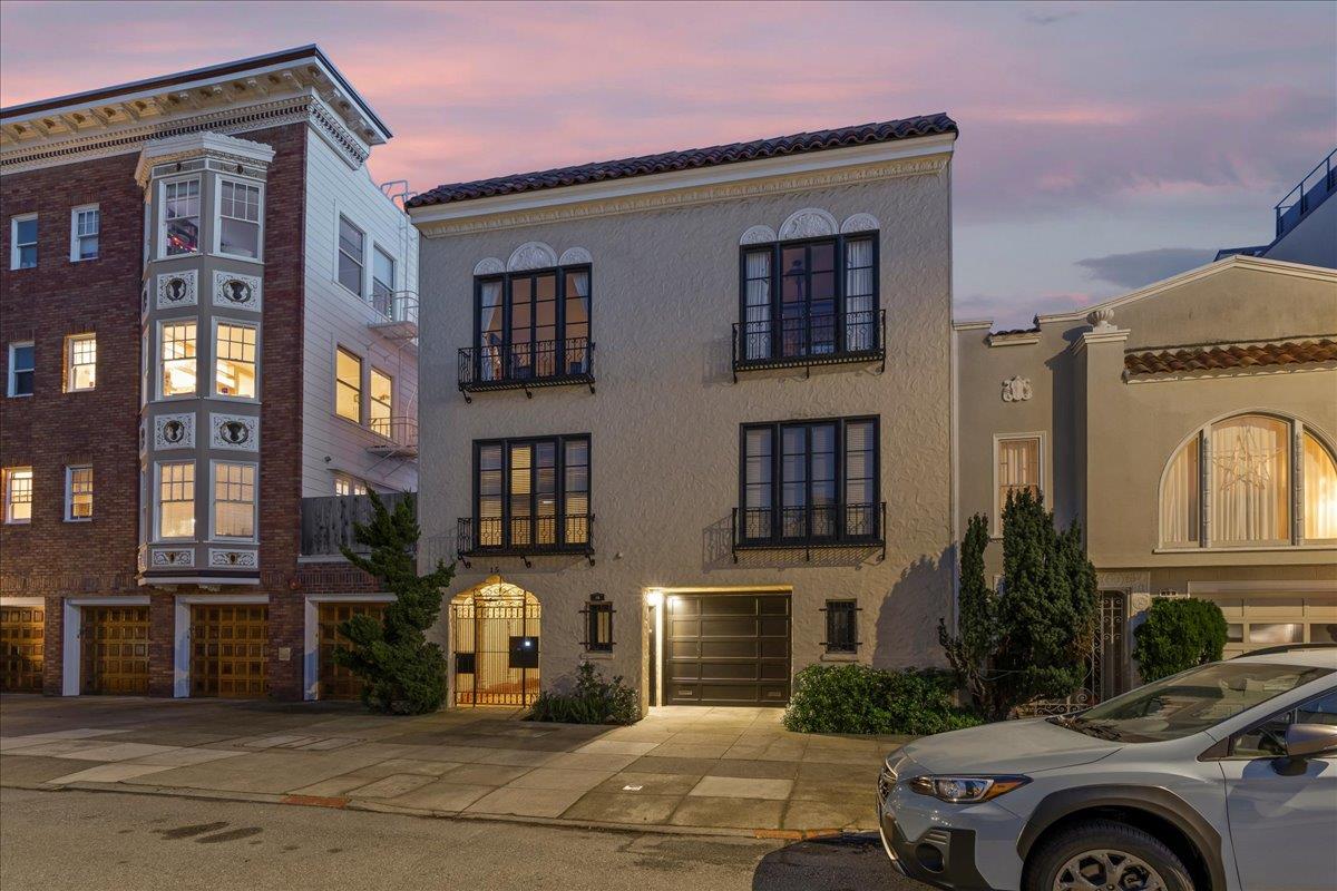 15 Rico Way, Unit 3 San Francisco, CA 94123 - Photo 1 of 46 a front view of a residential apartment building with a yard