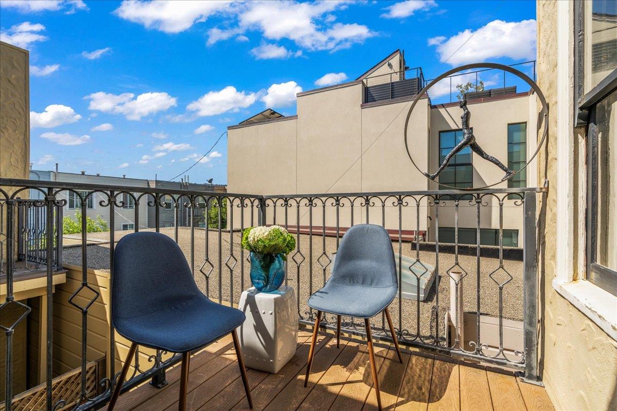 15 Rico Way, Unit 3 San Francisco, CA 94123 - Photo 12 of 46 a balcony with table and chairs
