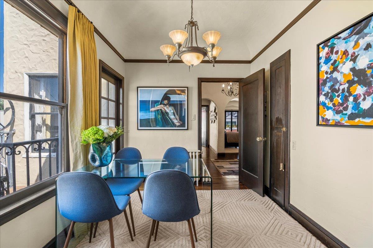 15 Rico Way, Unit 3 San Francisco, CA 94123 - Photo 17 of 46 a dining room with furniture and a chandelier