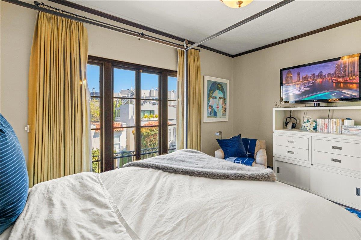 15 Rico Way, Unit 3 San Francisco, CA 94123 - Photo 22 of 46 a bedroom with a bed and a window