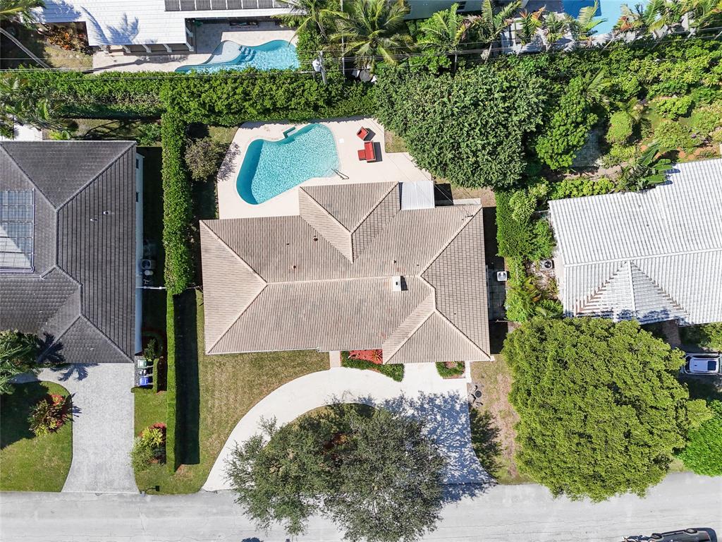 2517 Northeast 26th Terrace Fort Lauderdale, FL 33305 - Photo 30 of 42 an aerial view of a house with a yard and a large tree