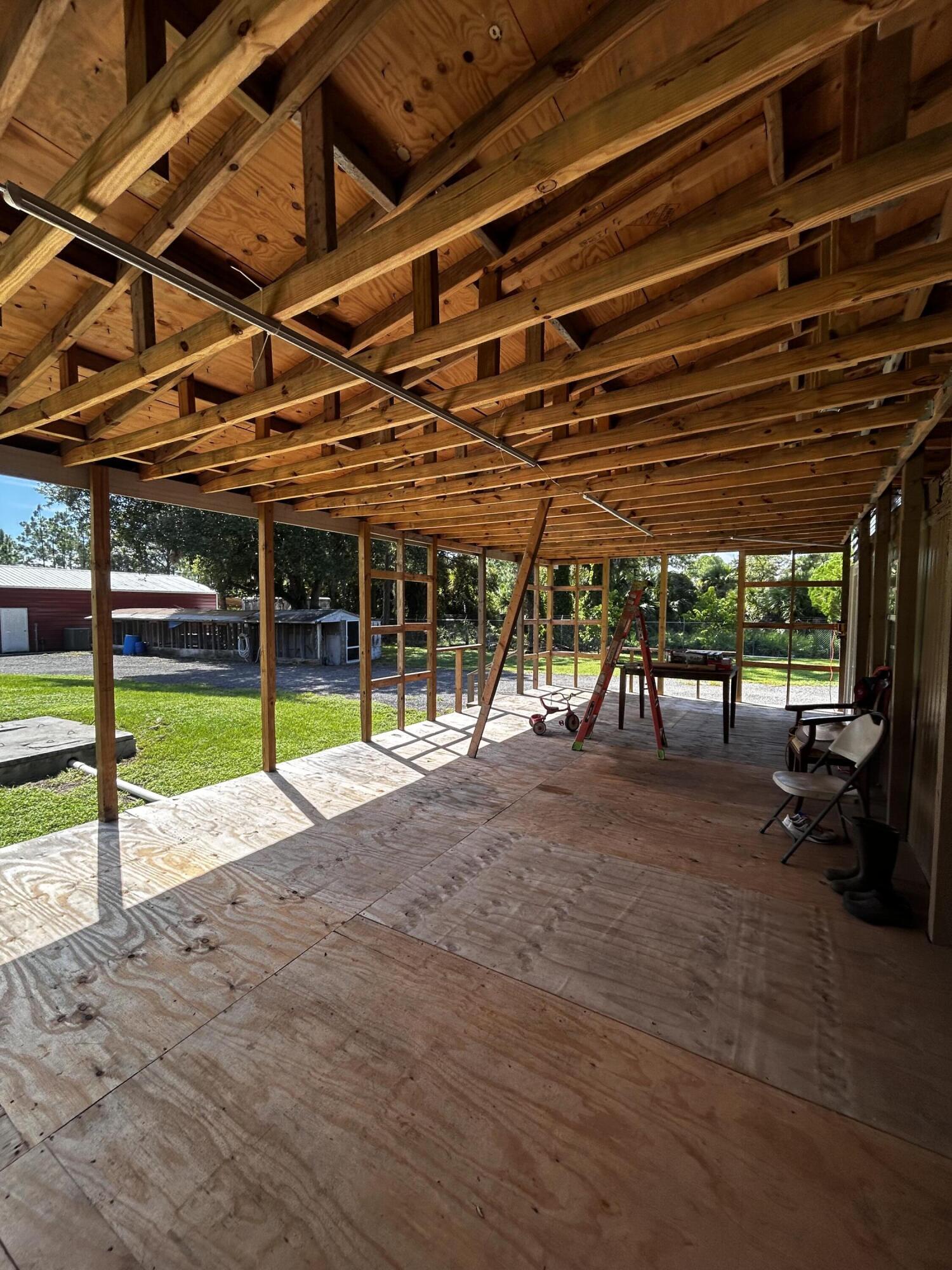 425 South Quebrada Street Clewiston, FL 33440 - Photo 51 of 56 a view of a swimming pool with a patio