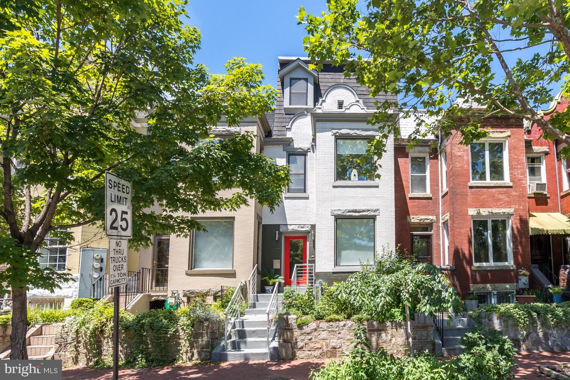 117 T Street Northwest, Unit 2 Washington, DC 20001 - Photo 1 of 32 front view of a brick house with a large windows