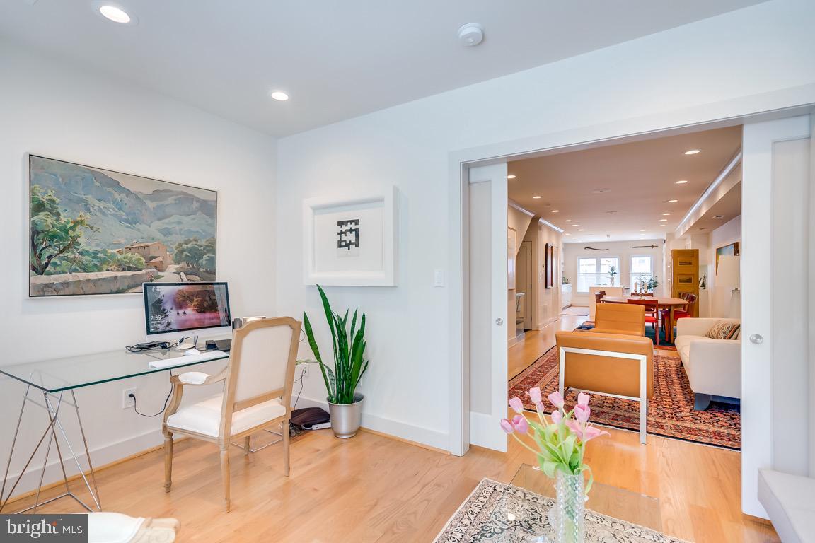 117 T Street Northwest, Unit 2 Washington, DC 20001 - Photo 15 of 32 a room with furniture and a potted plant