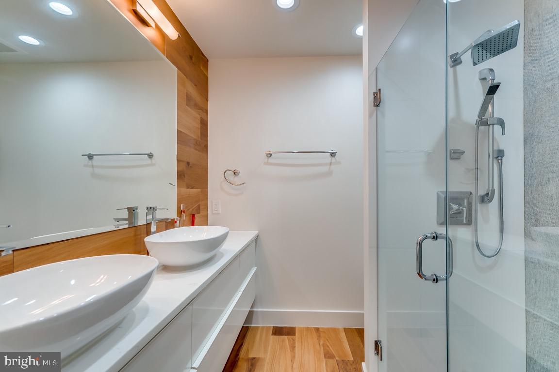 117 T Street Northwest, Unit 2 Washington, DC 20001 - Photo 22 of 32 a bathroom with a tub and shower