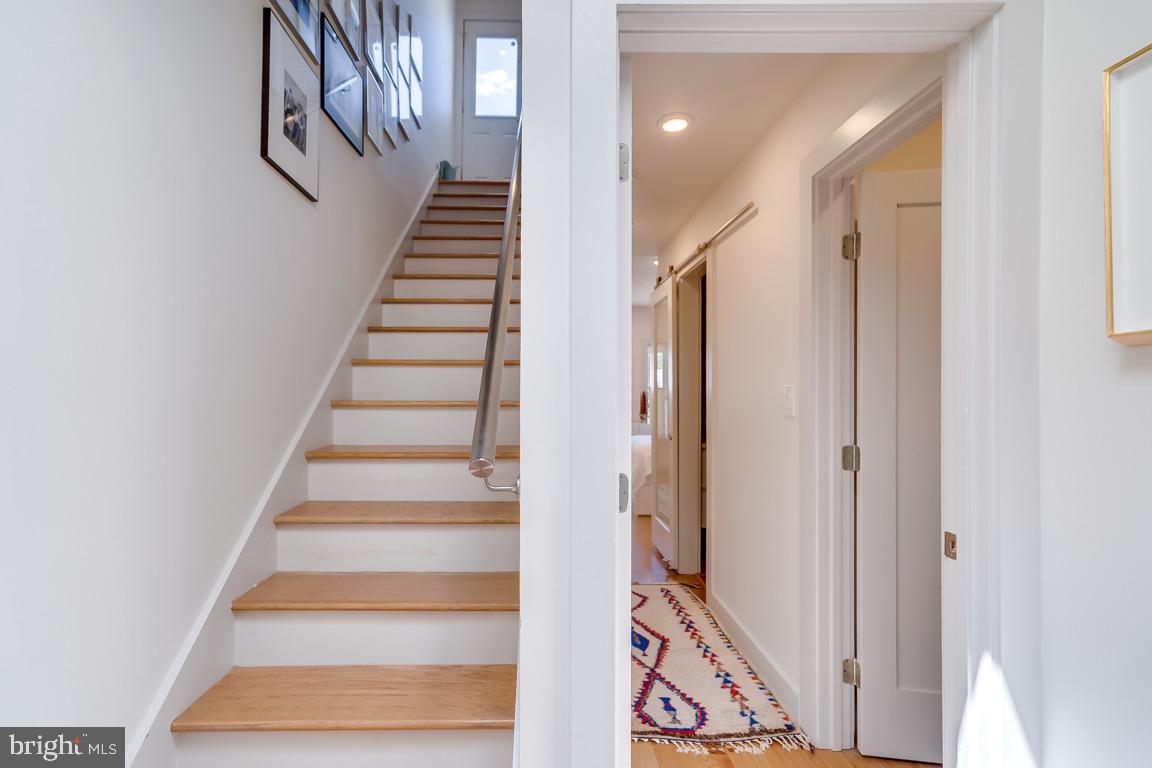 117 T Street Northwest, Unit 2 Washington, DC 20001 - Photo 27 of 32 a view of staircase with white walls and white walls