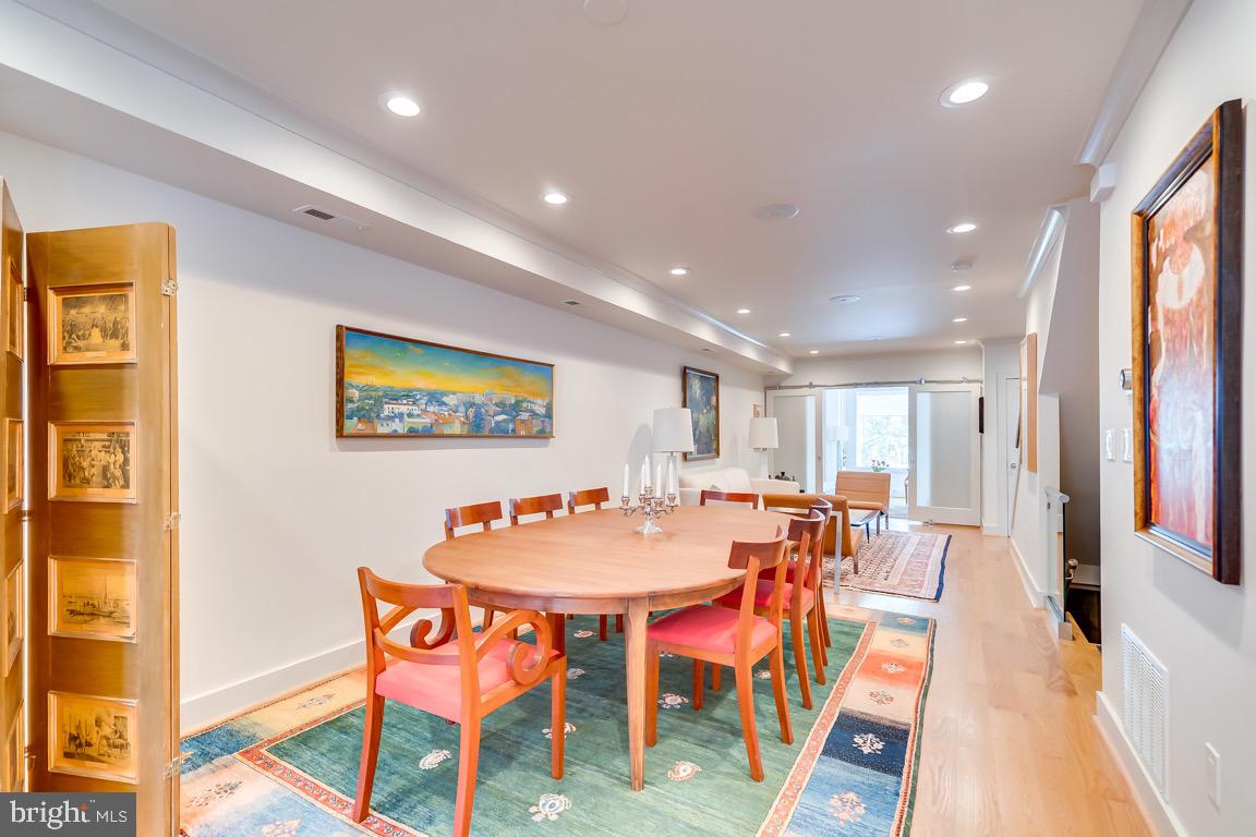 117 T Street Northwest, Unit 2 Washington, DC 20001 - Photo 8 of 32 a dining room with a table and chairs