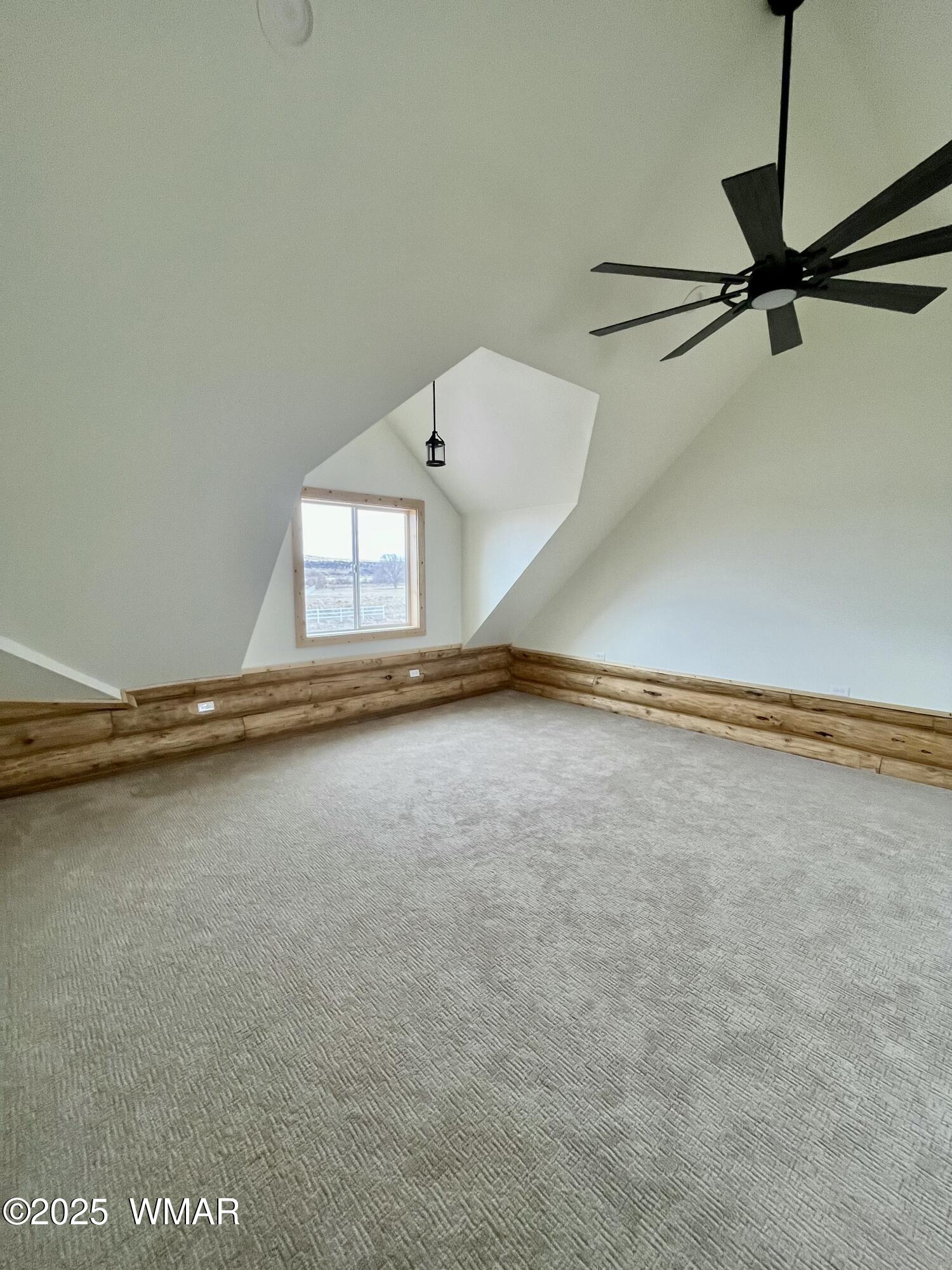 446 Becker Lake Road Springerville, AZ 85938 - Photo 15 of 18 a view of a room with racks on the wall
