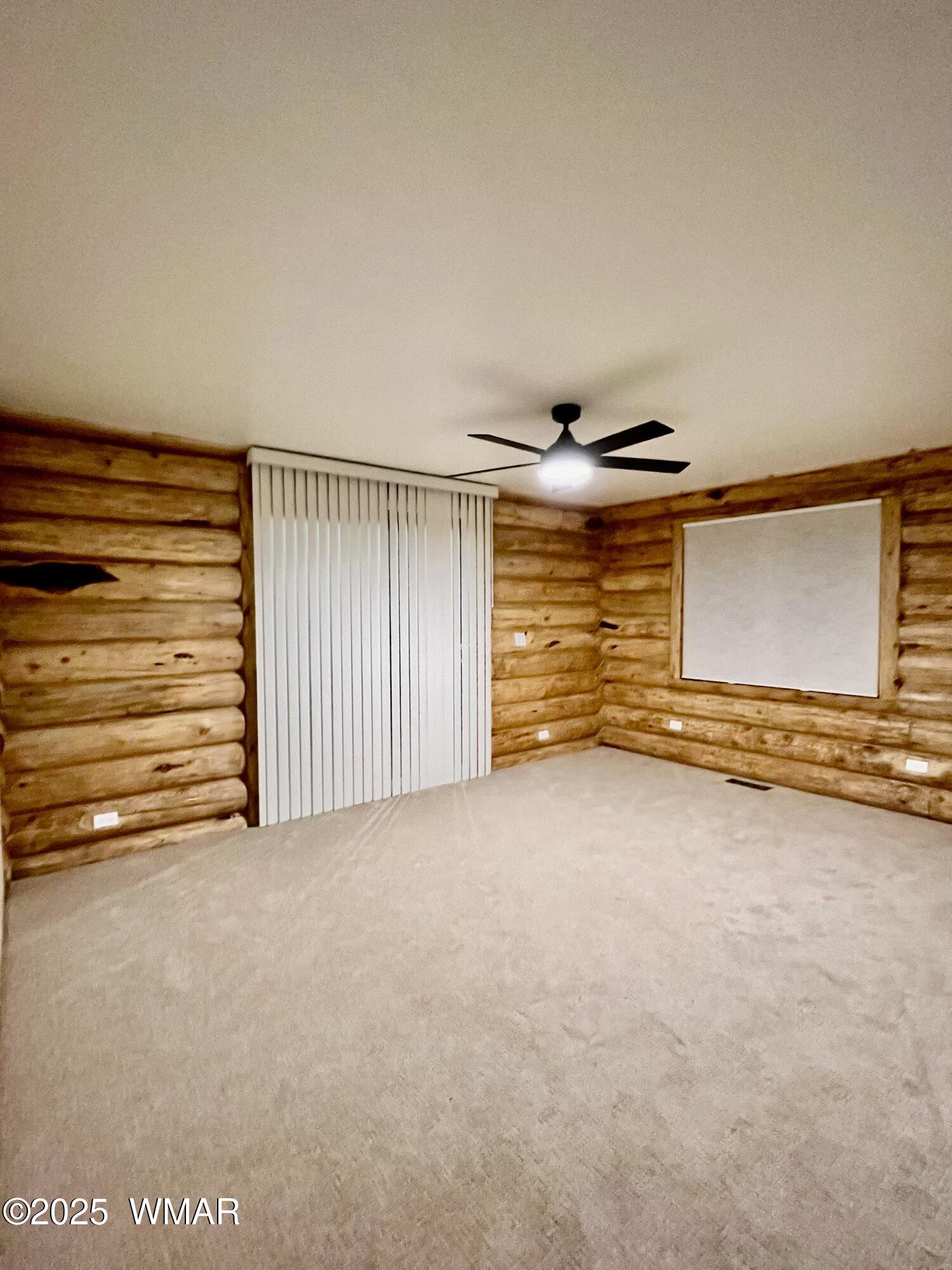 446 Becker Lake Road Springerville, AZ 85938 - Photo 8 of 18 a view of an empty room and window