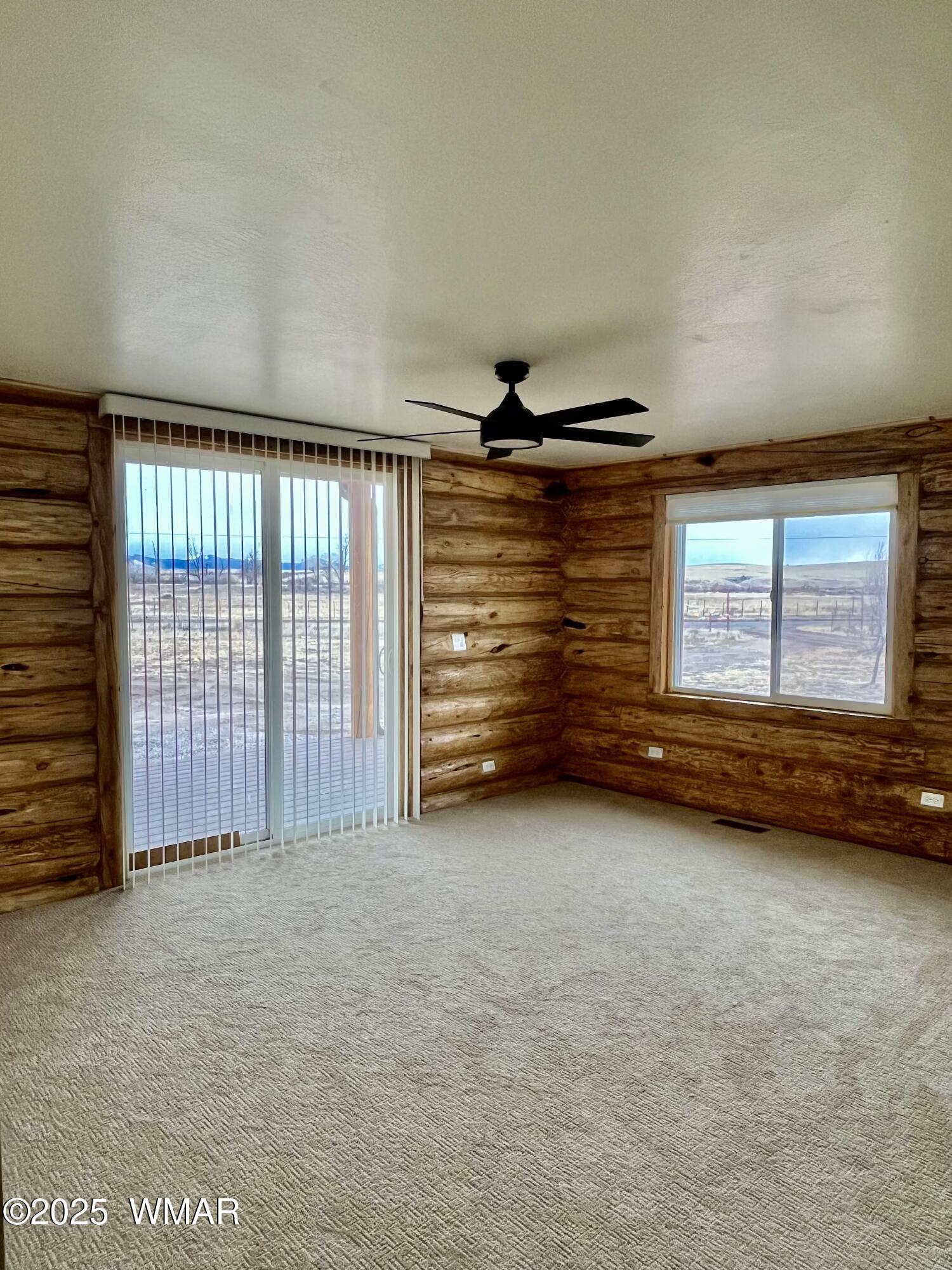446 Becker Lake Road Springerville, AZ 85938 - Photo 9 of 18 an empty room with windows