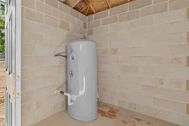 a view of a lake with houses in the back