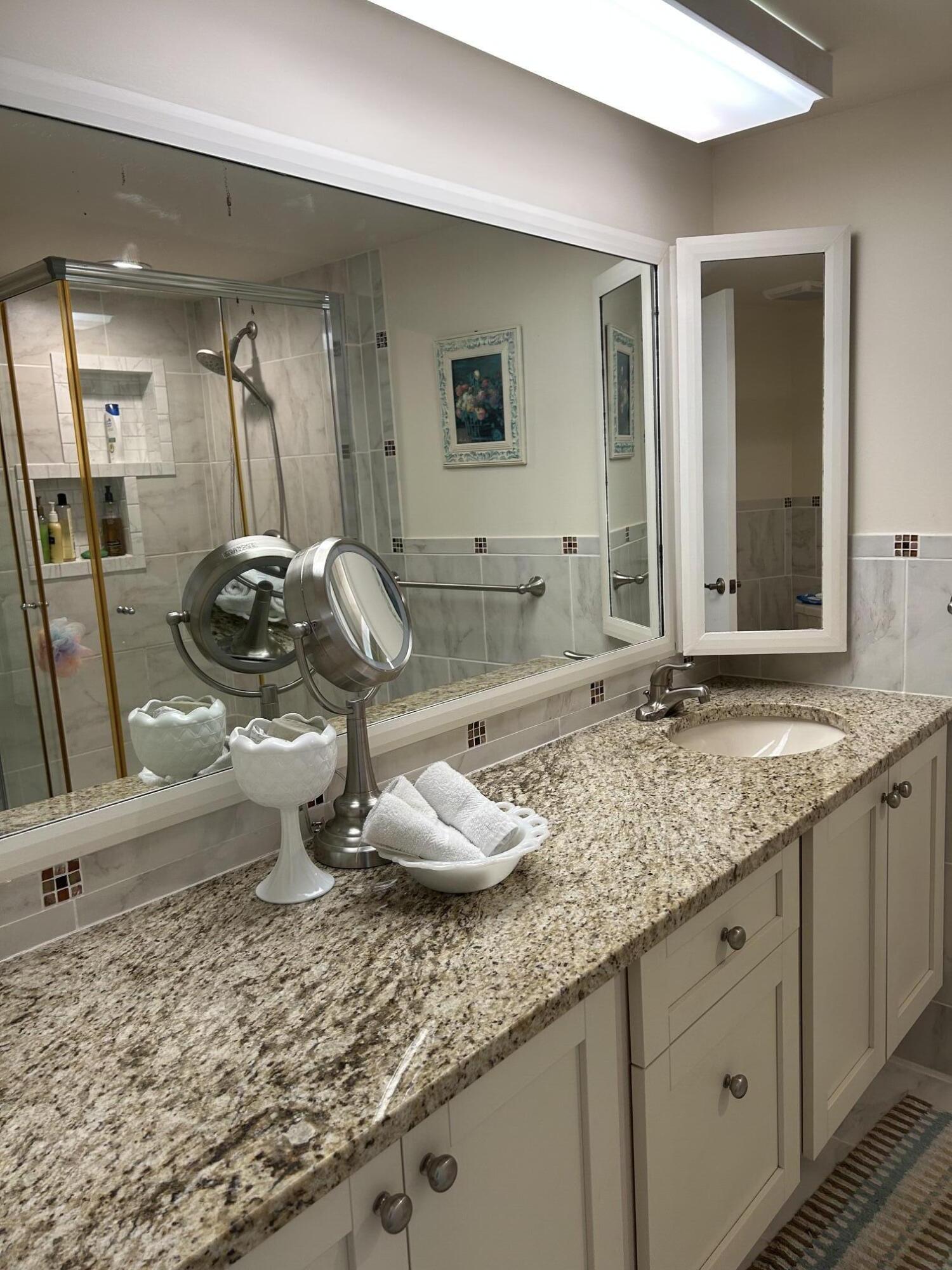 1007 10th Court Jupiter, FL 33477 - Photo 11 of 26 Primary Bathroom