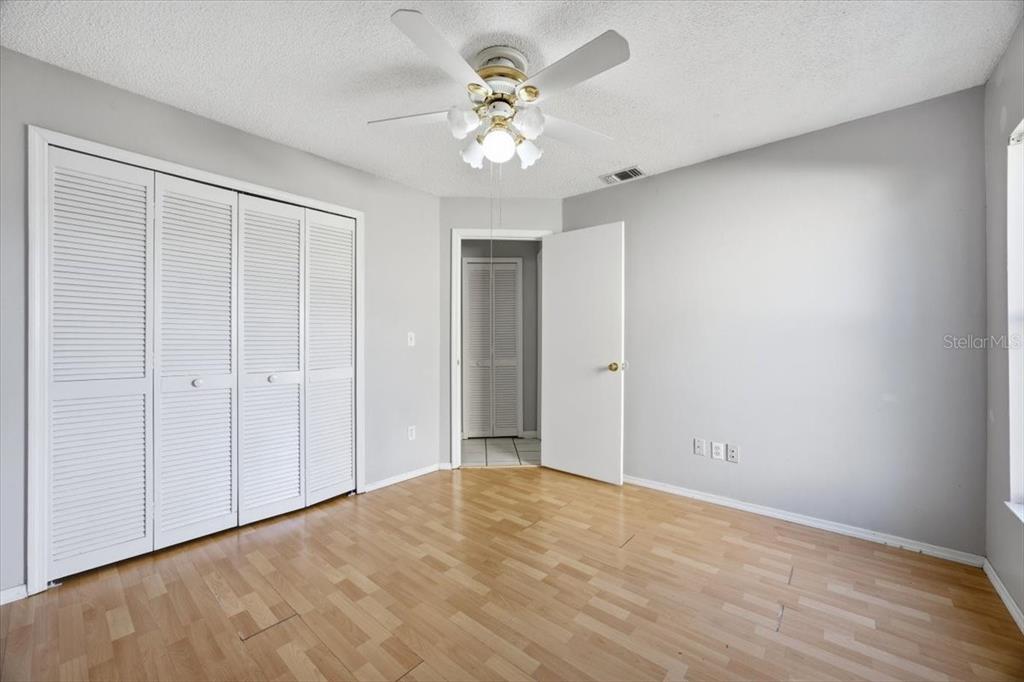 364 Nevada Loop Road Davenport, FL 33897 - Photo 16 of 26 a view of a livingroom with a chandelier fan