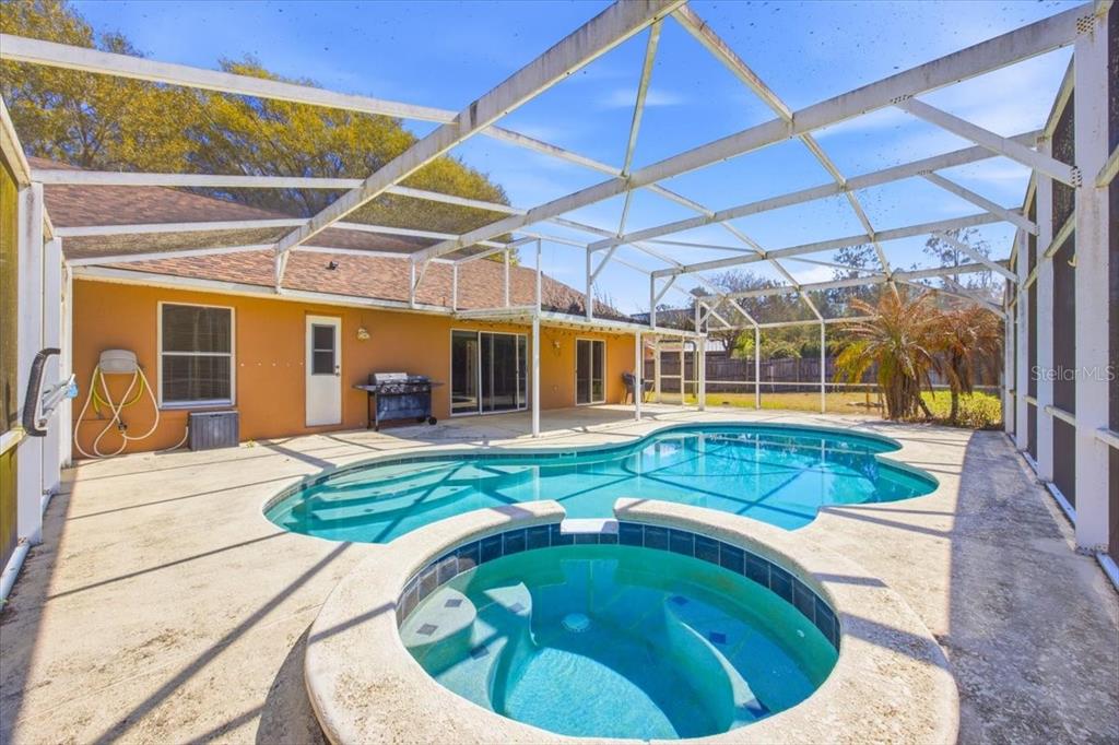 364 Nevada Loop Road Davenport, FL 33897 - Photo 24 of 26 a house view with a swimming pool