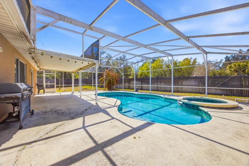 364 Nevada Loop Road Davenport, FL 33897 - Photo 25 of 26 a view of swimming pool with outdoor seating
