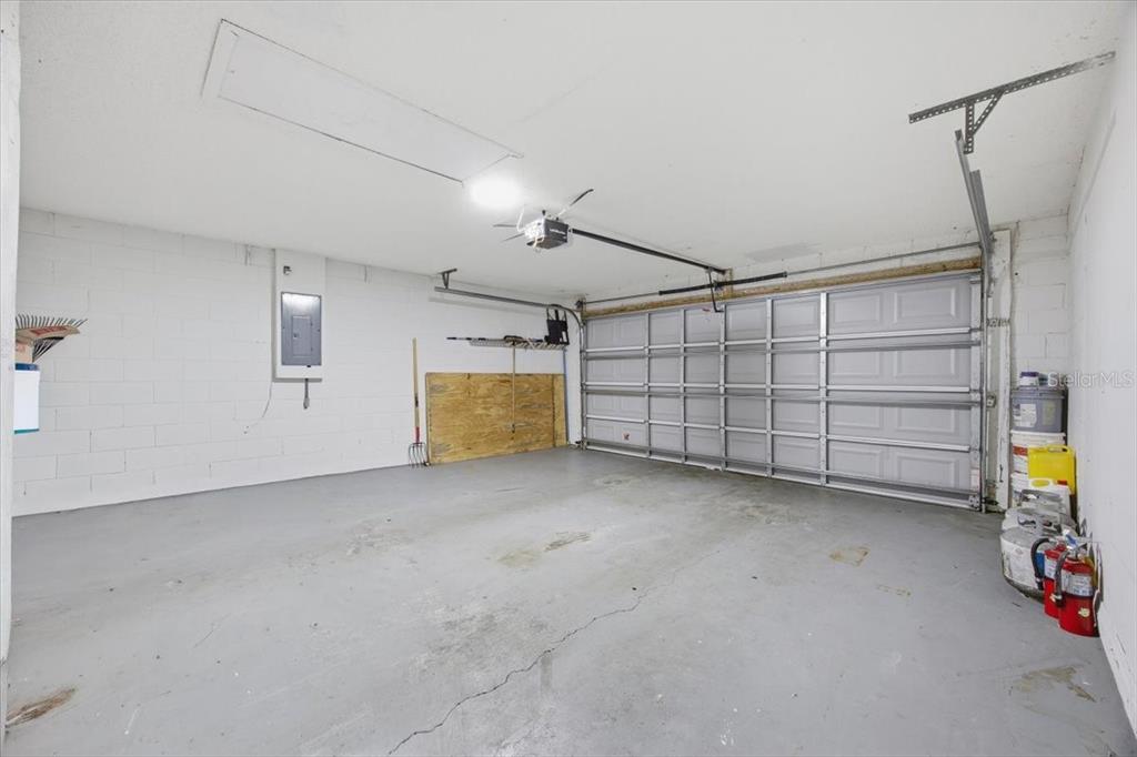 364 Nevada Loop Road Davenport, FL 33897 - Photo 9 of 26 a view of a garage