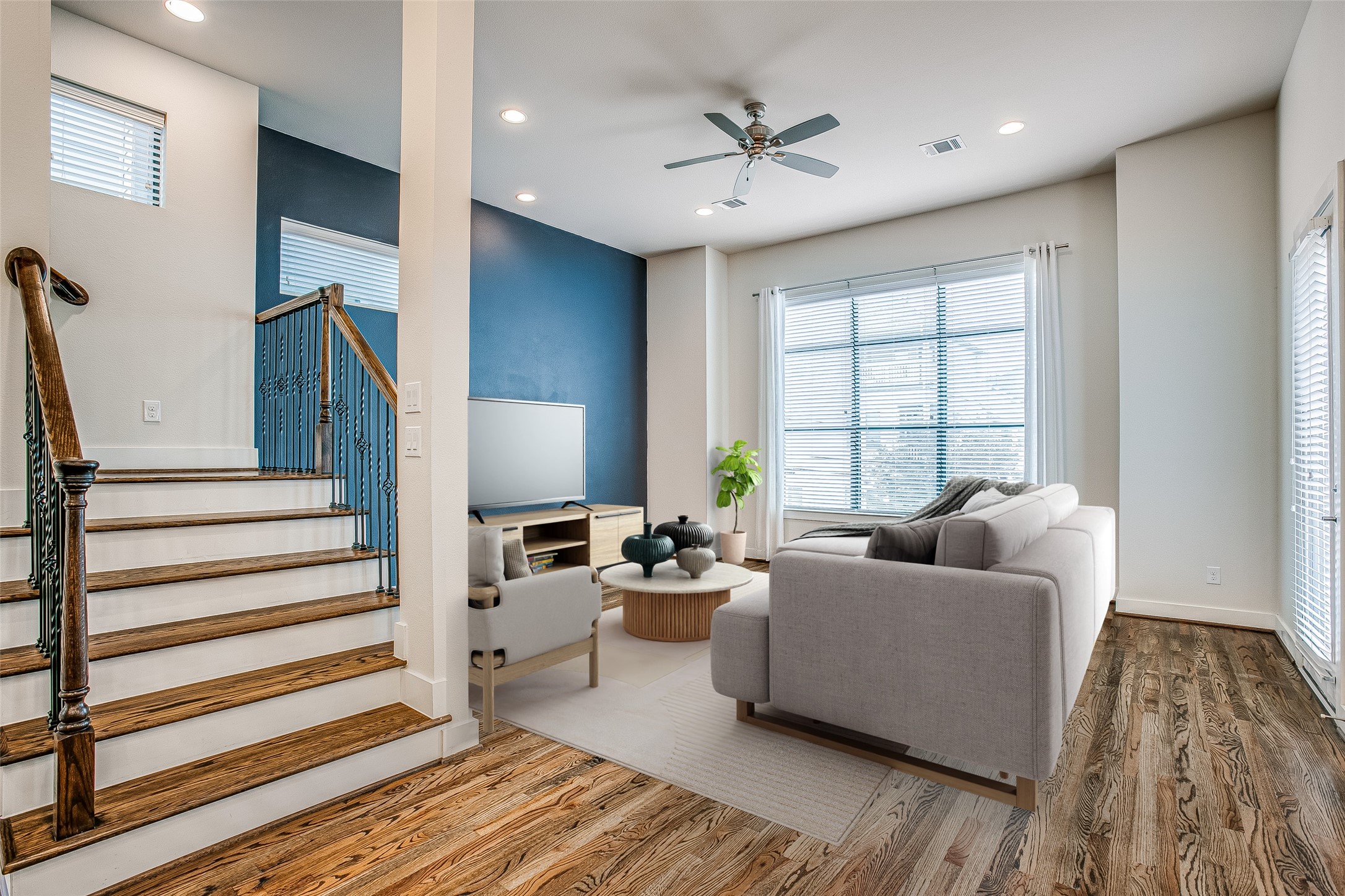 1508 Beall Street Houston, TX 77008 - Photo 12 of 38 a living room with furniture and a wooden floor