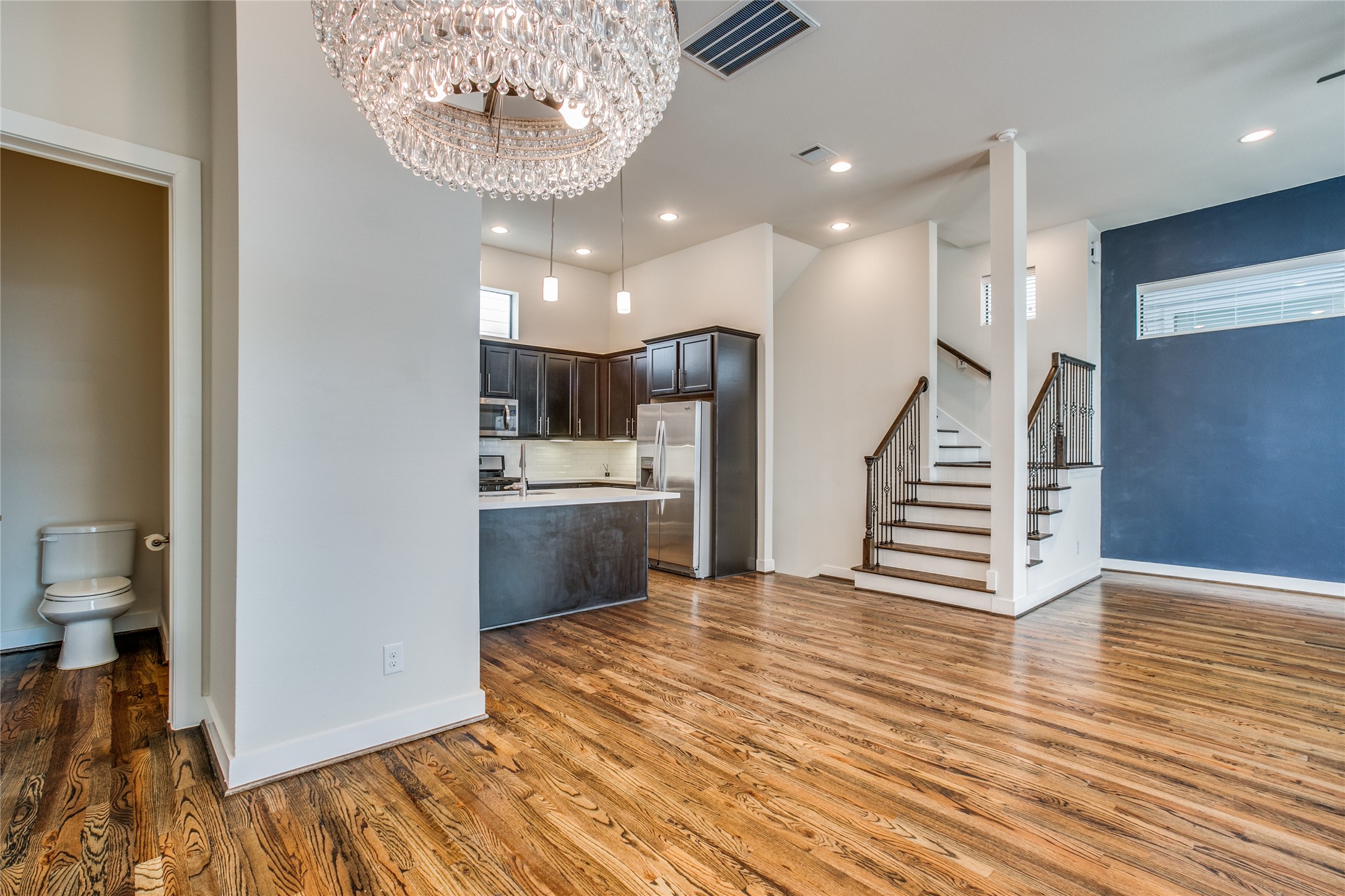 1508 Beall Street Houston, TX 77008 - Photo 26 of 38 a view of entryway and kitchen with wooden floor