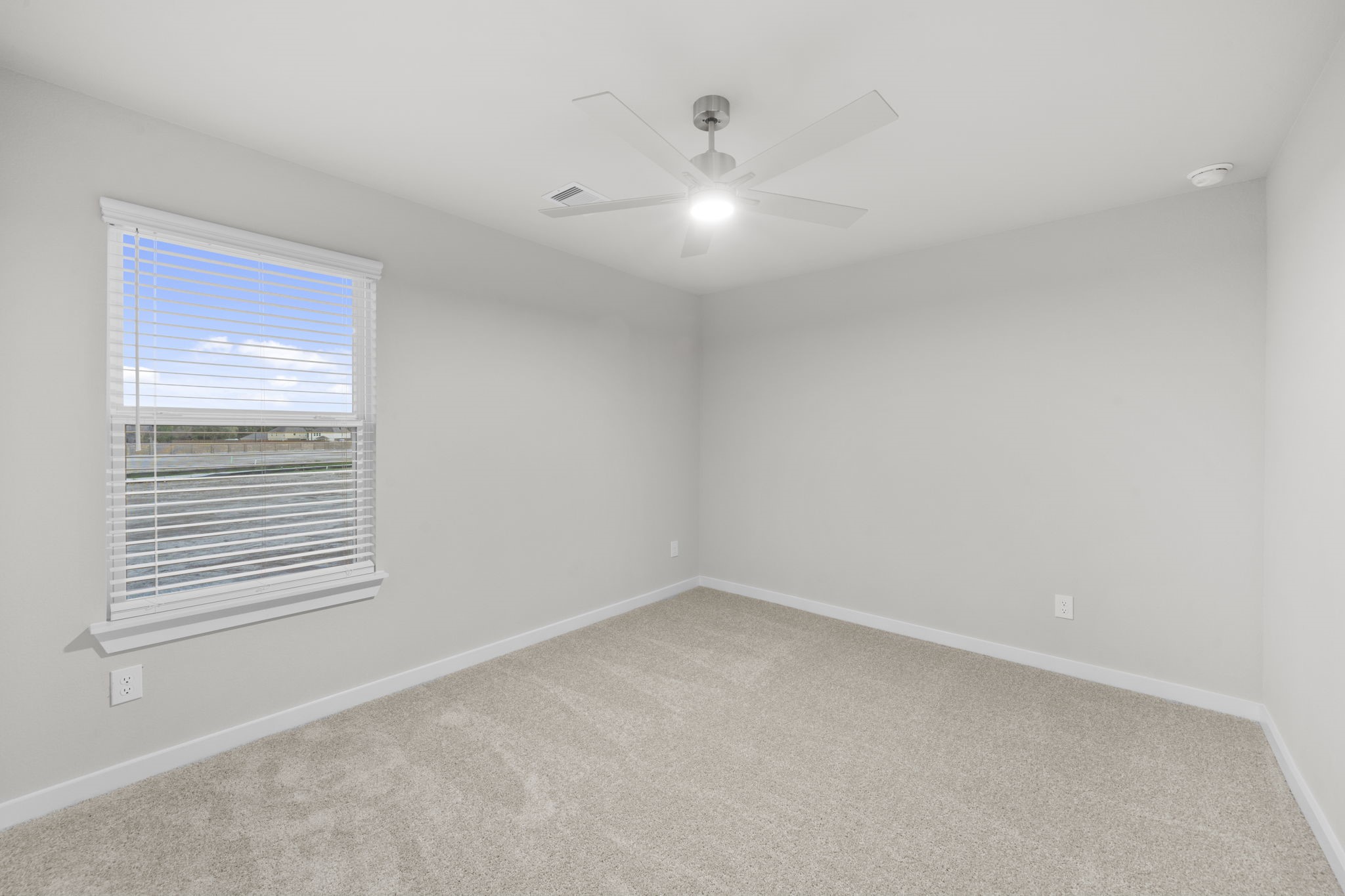 3015 Boulder Ridge Drive Rosenberg, TX 77471 - Photo 24 of 34 a view of an empty room with a window