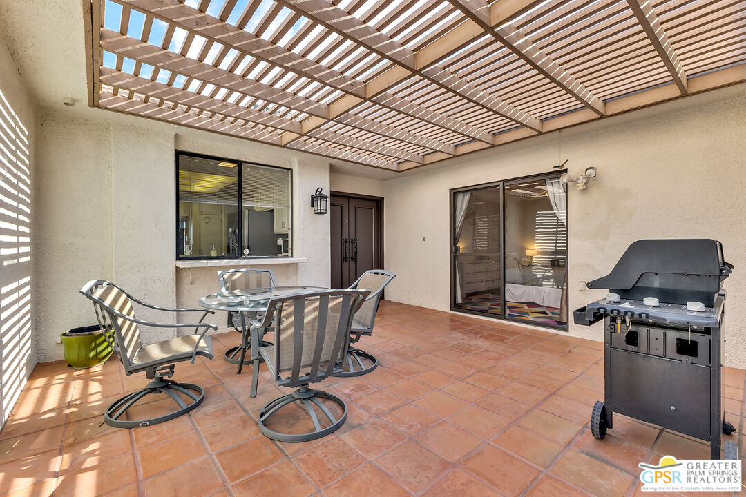28 Calle Encinitas Rancho Mirage, CA 92270 - Photo 25 of 57 a view of a dining room with furniture window and outside view