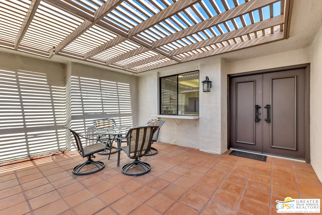 28 Calle Encinitas Rancho Mirage, CA 92270 - Photo 26 of 57 a view of a room with furniture and windows