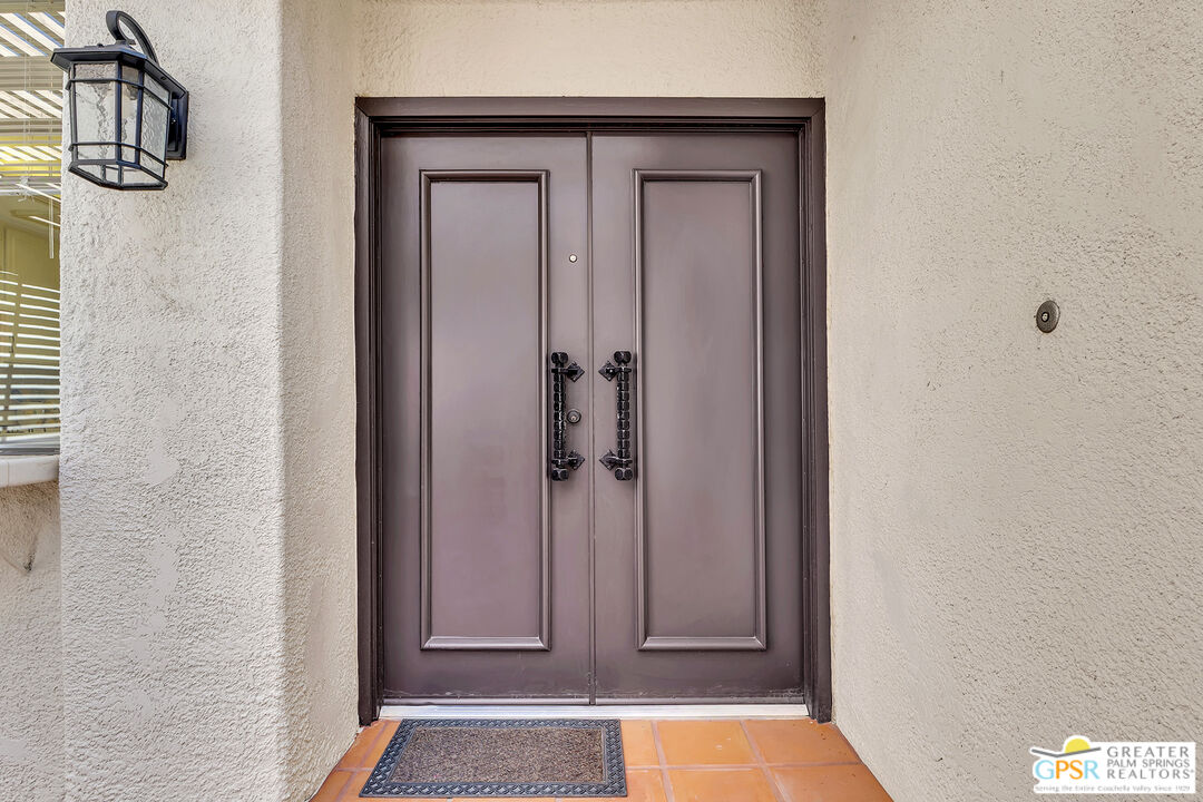 28 Calle Encinitas Rancho Mirage, CA 92270 - Photo 28 of 57 a view of a hallway with wooden floor