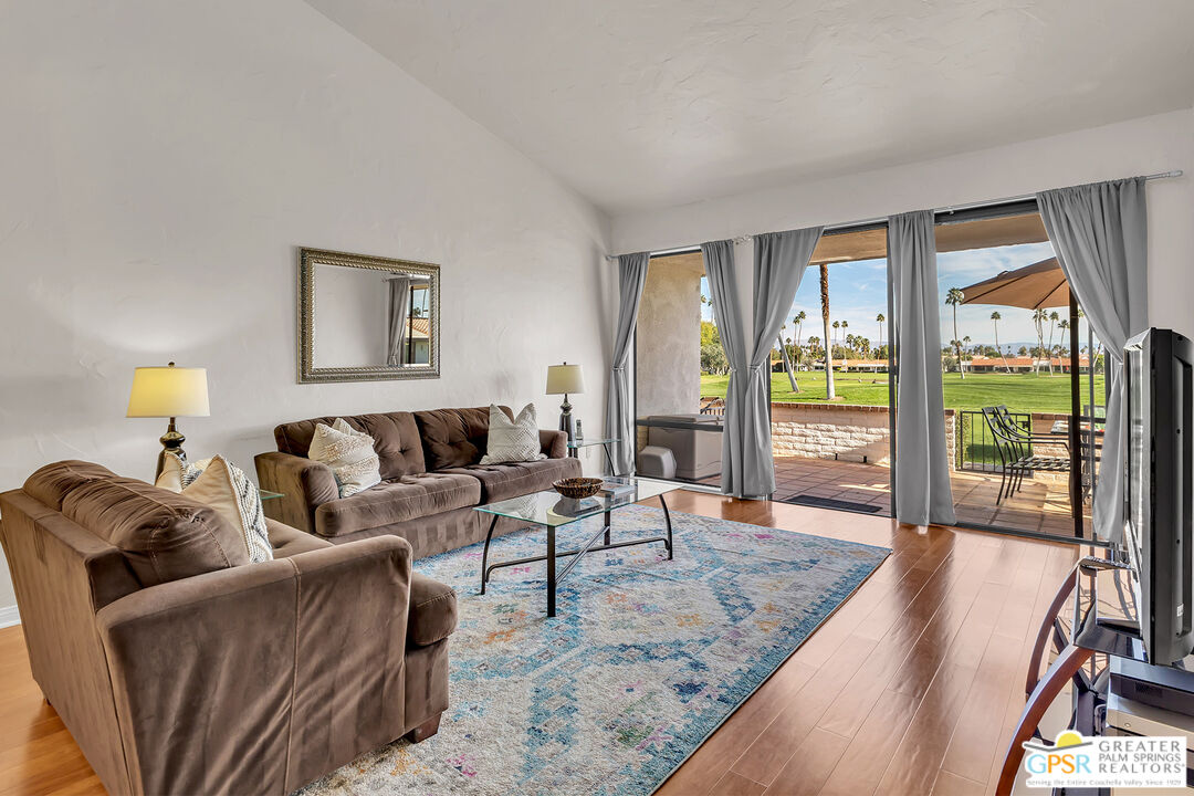 28 Calle Encinitas Rancho Mirage, CA 92270 - Photo 32 of 57 a living room with furniture and a large window